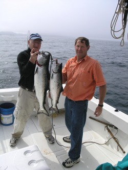 Joe and guest with salmon